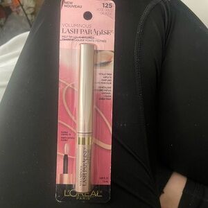 L’Oreal voluminous lash paradise rose gold felt tip liquid eyeliner.